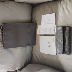 Authentic Louis Vuitton Porte tresor wallet.